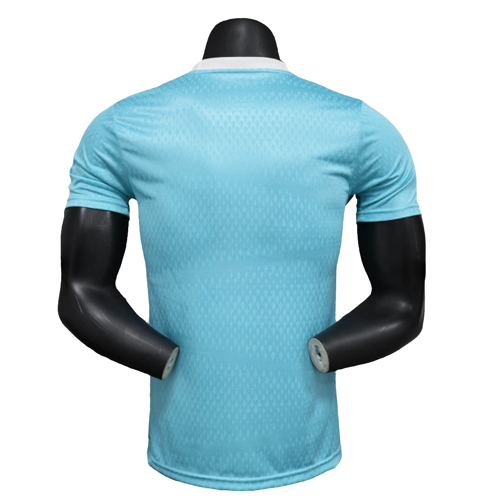 Camisa Arsenal 25/26 Pré-Jogo - Azul Celeste - Versão Jogador